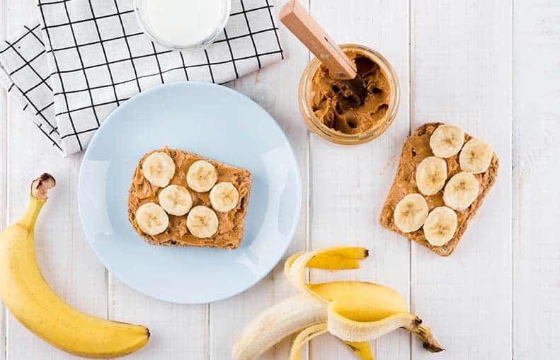 Parallelo Health - your source for health, workouts, food, supplements and more - blog - 10 Healthy Snacks That Keep You Slim - Ezekiel Bread With Banana and Peanut Butter